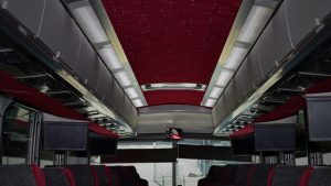 Barons Bus interior shot of center aisle to front
