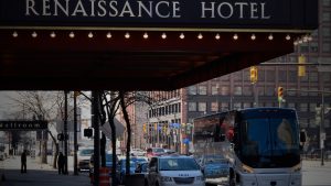Barons Bus parked in front of Renaissance Hotel entrance