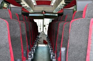 barons bus interior gray seats with red lining