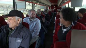 barons bus tickets header happy seated customers