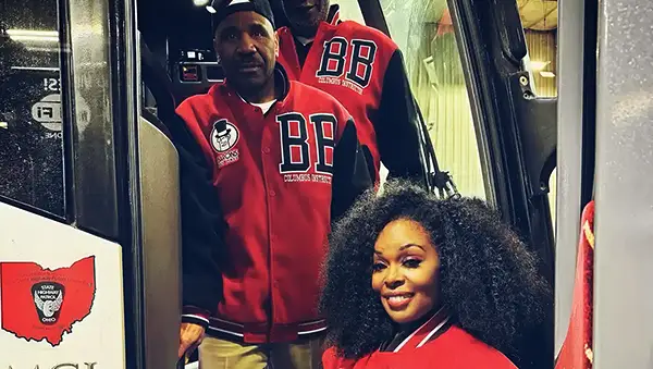 barons bus employment hero drivers wearing jackets deboarding motorcoach wide